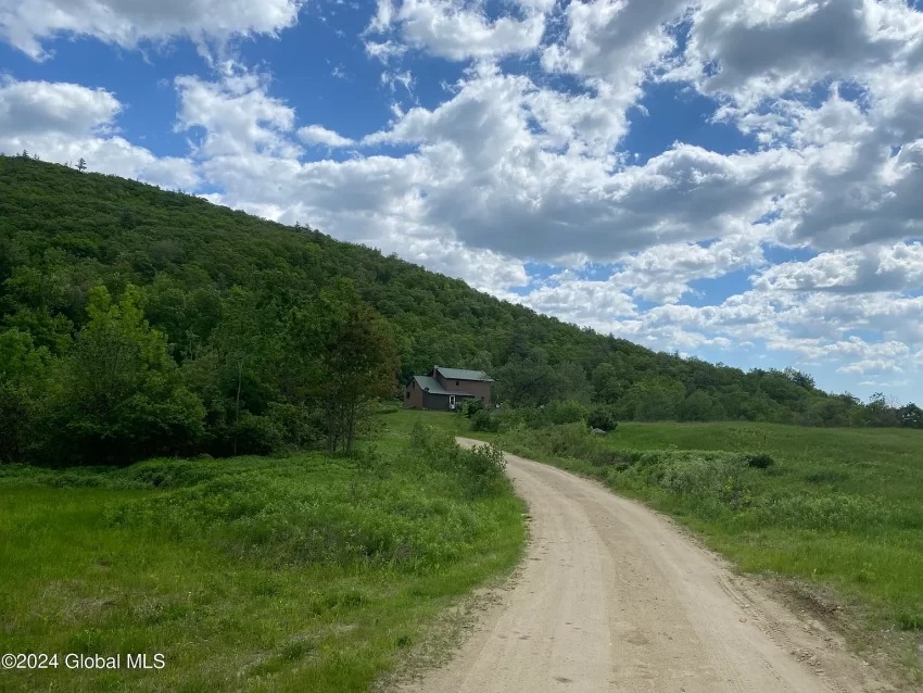 Charming 4-Bedroom Home on 42 Acres in Moriah, New York