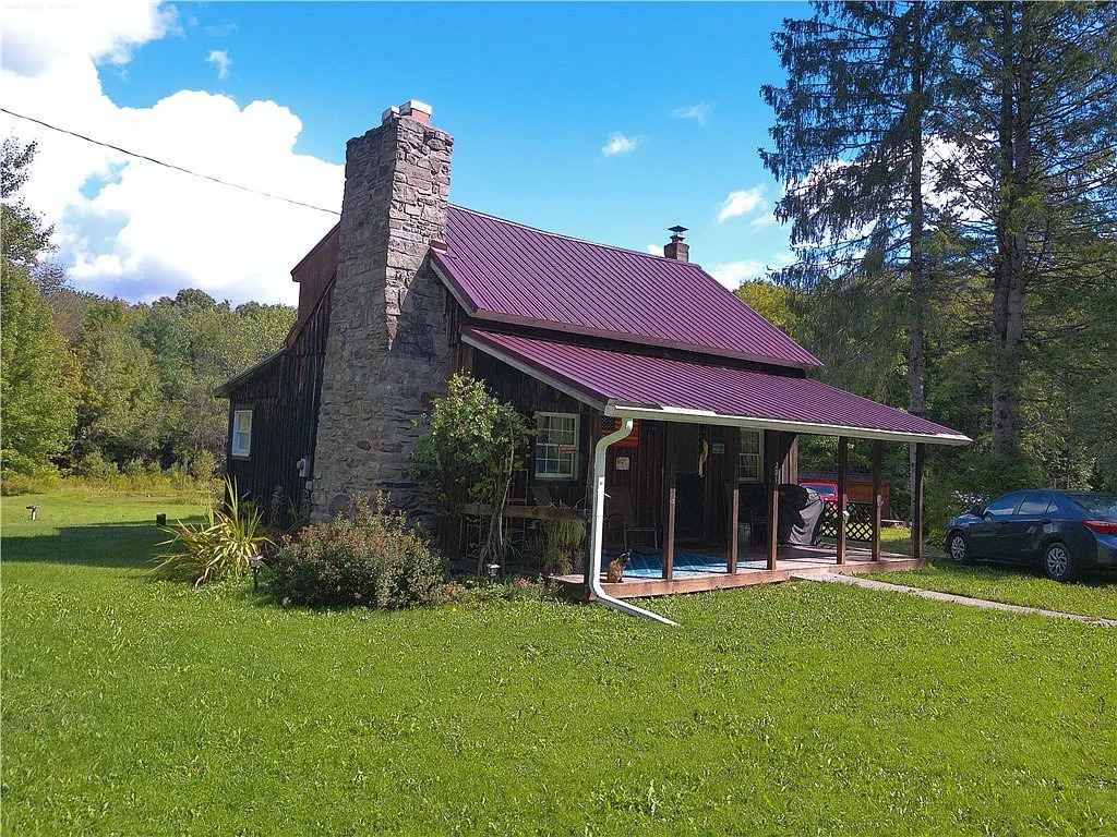 Cabin with Pond and Acreage in Oxford, New York