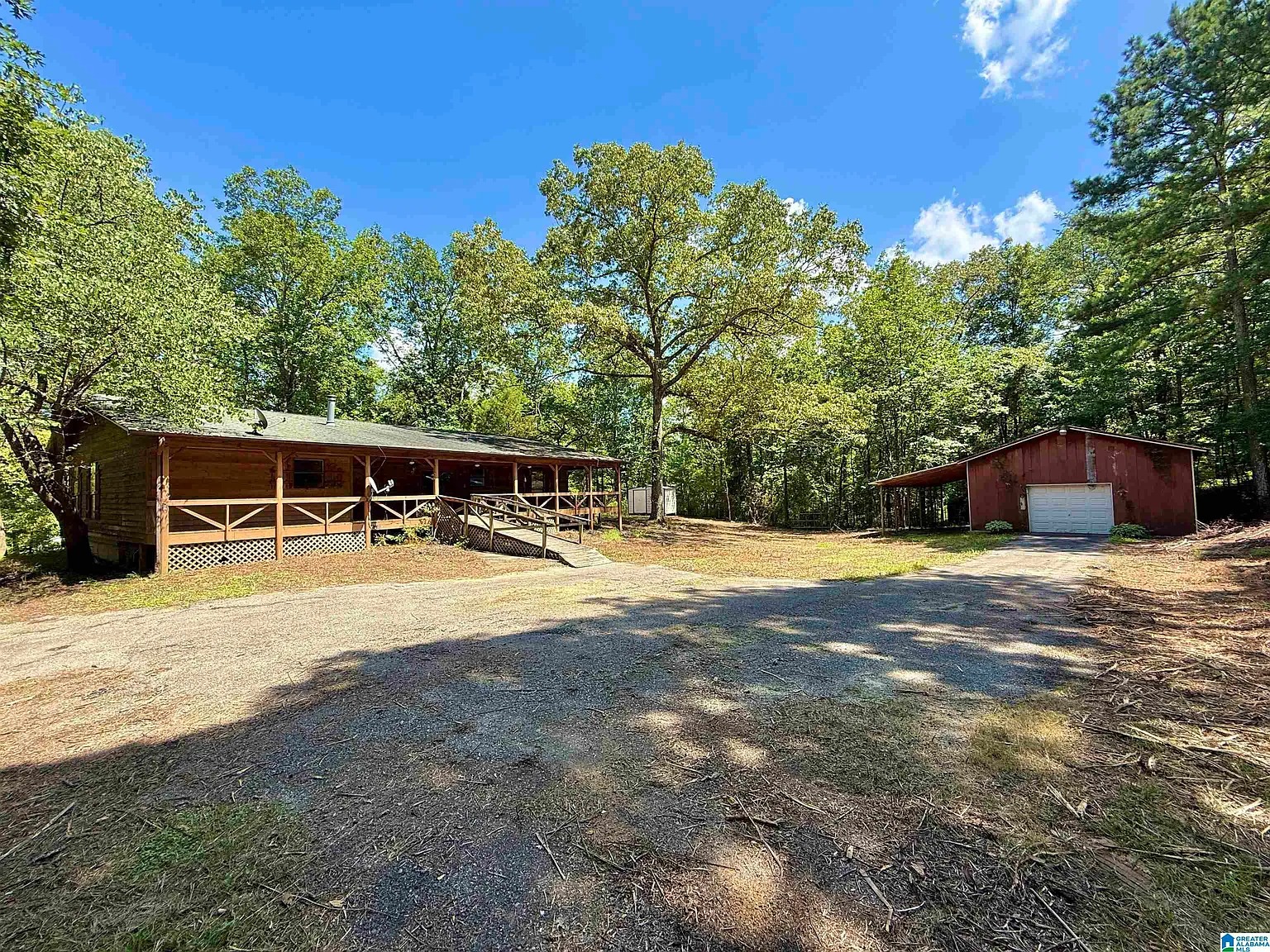 Cabin-Style Home with Pond and Acreage in Pell City, Alabama