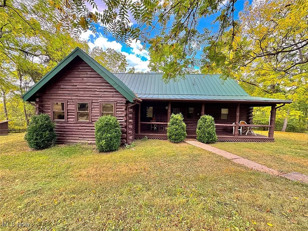 63-Acre Property with Lodge, Pond, and Hunting Land in Freeport, Ohio