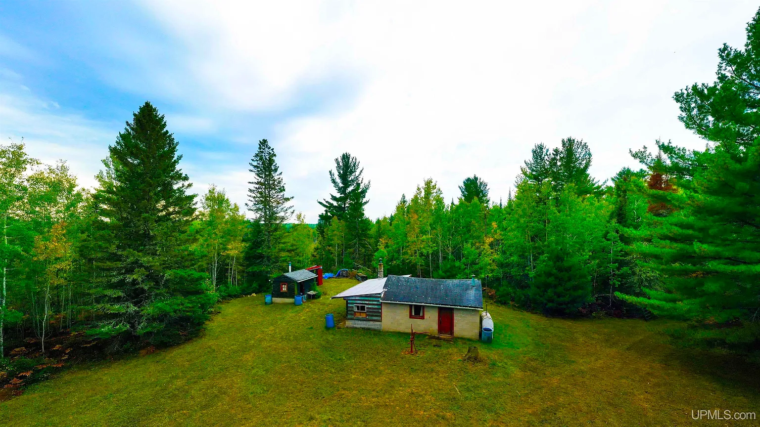 Camp with 100 Acres in Perronville, Michigan