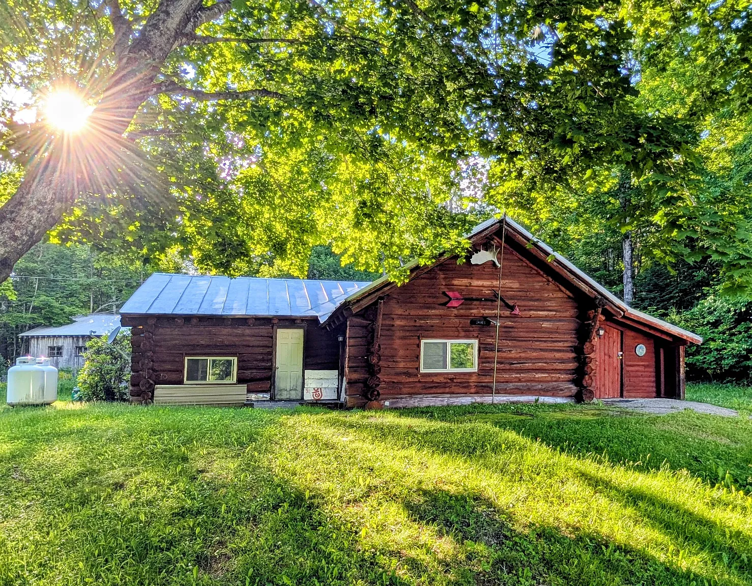 Log Cabin with 31 Acres in Madrid, Maine